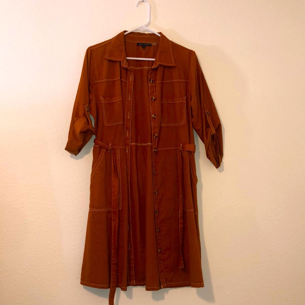 Women’s dress, large, burnt orange, great condition.